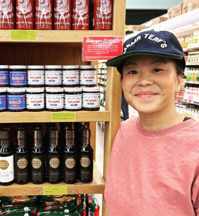 An Instagram image of someone holding a mild jar of Mama Teav'e Hot Garlic Chili Crisp