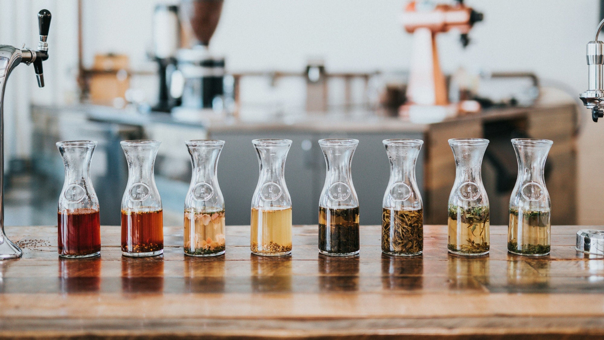 An assortment of oils in little carafes